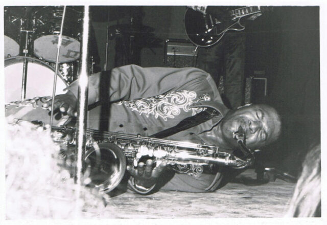 Junior Walker got so into the music, then he laid down to play his saxophone.